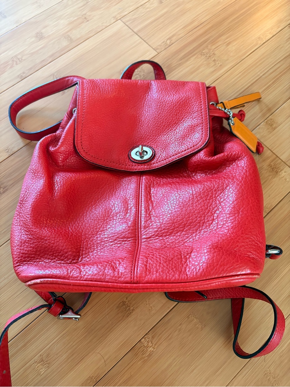 Coach Pebbled Leather Backpack in Red with Orange Tag